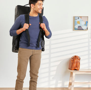 image of a person wearing the Roam Padded Roller Backpack